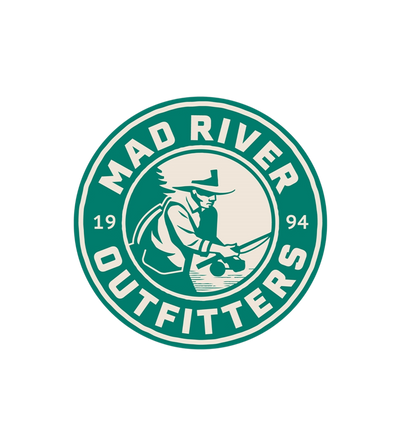 A circular green and cream logo for Mad River Outfitters, featuring a fisherman in a hat casting a line in the center, with the brand name arched around the top and bottom edges and the years 19 and 94 on either side.